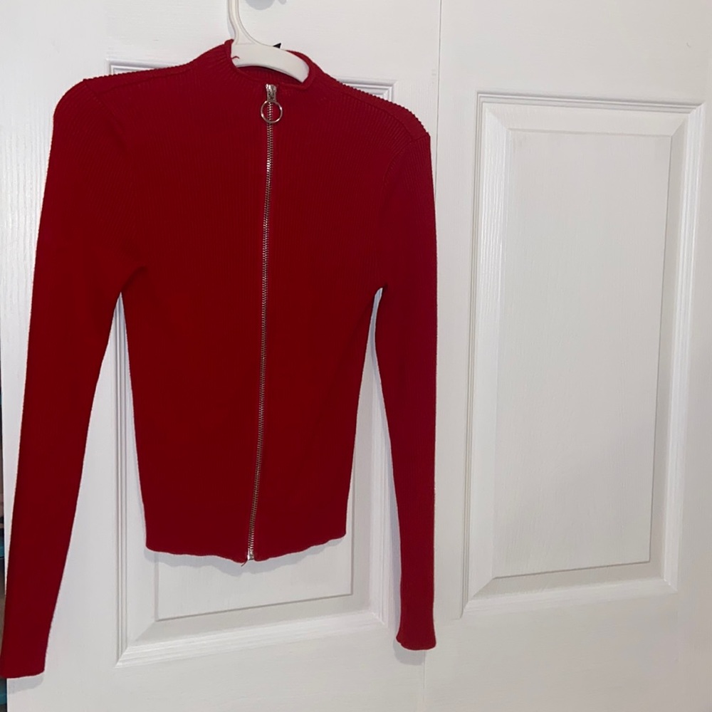 Red Sweater tight fit size Small really soft and nice.